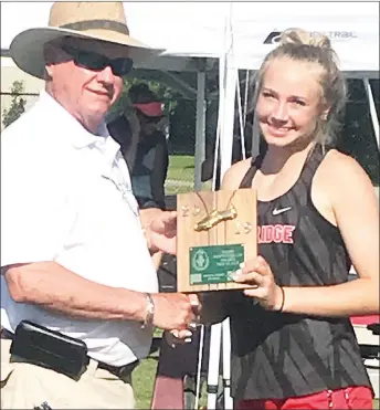  ?? Photograph courtesy of Heather Wade ?? Lady Blackhawk Blakelee Winn was presented with a third-place plaque for her scores in the heptathlon last week.