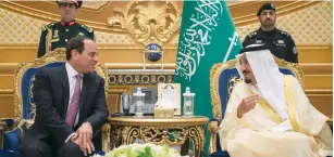  ?? (Reuters) ?? SAUDI ARABIAN King Salman bin Abdulaziz Al Saud (right) meets with Egyptian President Abdel Fattah al-Sisi in Riyadh yesterday.