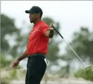  ?? LYNNE SLADKY — THE ASSOCIATED PRESS ?? Police say golf great Tiger Woods was arrested on a DUI charge in Florida. The Palm Beach County Sheriff’s Office says on its website that Woods was booked into a county jail around 7 a.m. on Monday.