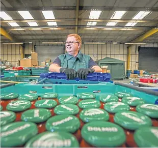  ?? Picture: Mhairi Edwards. ?? John Thompson in the warehouse.