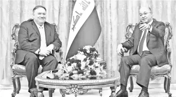  ??  ?? Pompeo meets with Iraq’s President Barham Saleh in Baghdad, Iraq, during a Middle East tour. — Reuters photo