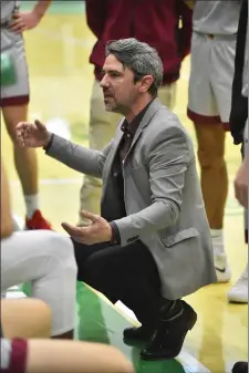  ?? ELLIOTT PORTILLO — CAL POLY HUMBOLDT, FILE ?? Coach Ryan Bisio speaks to his team during the conference opener against Shasta. Bisio won Northern California Coach of the Year on Friday.