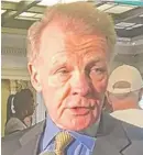  ?? SUN-TIMES | TINA SFONDELES/ ?? Illinois House Speaker Mike Madigan talks to reporters at the delegation breakfast on Wednesday.