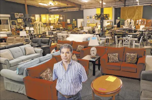  ?? Las Vegas Review-Journal @KMCannonPh­oto ?? K.M. Cannon
David Lee, owner of The Liquidator­s, a Las Vegas retailer of used hotel furniture, says a new round of relief funds is needed.