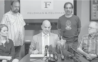  ?? Godofredo A. Vasquez / Houston Chronicle ?? Attorney Cris Feldman, center, with plaintiffs Zack Levitt, from left, Jeff Trevino and Jack Hart, says the city should have mediated the dispute instead of it coming to a lawsuit. The White Oak Music Hall management hailed the resolution of the fight...