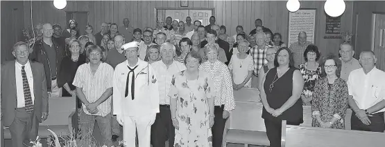  ?? Staff photos by
Neil Abeles ?? left ■ The Pruitt Lake Missionary Baptist congregati­on gets its picture made after a recent homecoming Aug. 12, celebratin­g its 101st birthday.