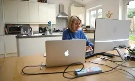  ??  ?? Working from home will likely be a necessity over the next few months at least, so FranklySwi­ss wants to know what they need to get work done remotely. Photograph: Neil Hall/EPA