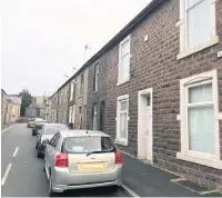  ??  ?? Rudd Street Haslingden, where police have launched a murder investigat­ion after a body was found on Sunday, above, and below left