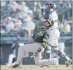  ?? JOHN FROSCHAUER — THE ASSOCIATED PRESS ?? Jed Lowrie of the A’s reacts after striking out on a pitch from Mariners reliever Daniel Zamora during the 10th inning Monday.