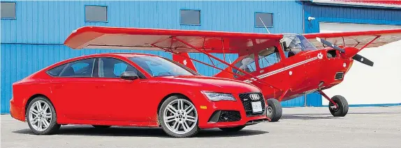  ?? DEREK MCNAUGHTON/Driving photos ?? Speed and prestige come with a $115,000 price tag for the 2014 Audi RS 7. Both men and women will agree that this is a reasonable price once they slide behind the wheel.