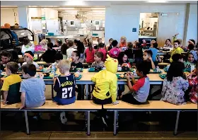  ?? ANDY CROSS – THE DENVER POST ?? First graders at S. Christa Mcauliffe STEM Academy school in Greeley at lunch together on Oct. 20, 2022.
