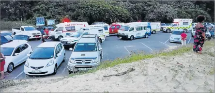 ?? Picture: PATRICK LEVEY ?? ONGOING SEARCH: EMS and police vehicles at Nahoon Beach on Wednesday evening where a search was launched for a missing 19-year-old
