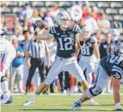  ?? Brandon Sumrall/Getty Images ?? Duke’s Grayson Loftis throws downfield against Troy during the first half of the Birmingham Bowl at Protective Stadium on Saturday in Birmingham, Ala.