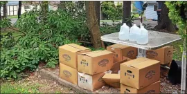  ?? MEDIANEWS GROUP FILE PHOTO ?? A supply of bottled water in front of a residence on Baghurst Drive in Upper Salford in 2014.