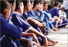  ?? POST STAFF ?? Prisoners sit at Prey Sar in Phnom Penh in 2010. A new committee to combat torture in Cambodia’s prisons and jails has been formed, with a prisons official’s father as its head.