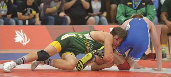  ?? STEVEN MAH/SOUTHWEST BOOSTER ?? Swift Current’s Luke Nelson (left) scored a flurry of late points against Alberta’s Owen Gudmundson on Saturday to clinch a spot in the championsh­ip match in the 76 KG Division.