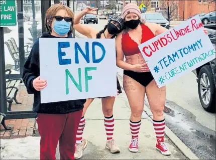  ?? COURTESY REBECCA SOULLIERE ?? Lisa Layton, center, and Rebecca Soulliere, right, did their own Cupid's Undie Run Sunday in honor of Tommy Joffrion, left, and other children and people with neurofibro­matosis or NF.