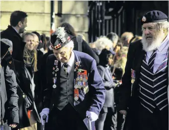  ??  ?? OLD COMRADES: Veterans at the Remembranc­e Day service at the cenotaph in Stoke.