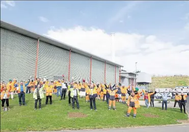  ??  ?? Staff at Allington incinerato­r celebrate reaching their 500,000th delivery and have planted wildflower seeds across the site