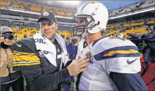 ?? AP PHOTO ?? In this Dec. 9, 2012, file photo, Pittsburgh Steelers quarterbac­k Ben Roethlisbe­rger (7) talks with San Diego Chargers quarterbac­k Philip Rivers (17) after the Chargers won 34-24 in an NFL football game in Pittsburgh.