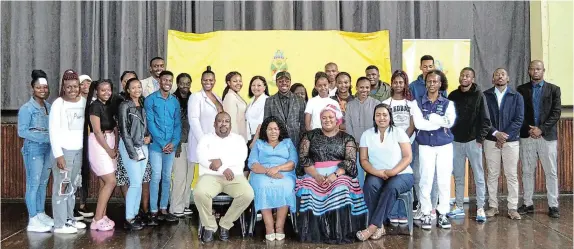  ?? Pictures: MARK CARRELS ?? SPECIAL MOMENT: Students get to know each other before receiving their registrati­on funding from Ndlambe Municipali­ty officials, seated in front.