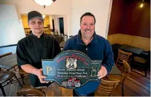  ??  ?? Godfrey’s BBQ and Grill chef Louwie Venter, left, has been busy learning recipes that general manager David Adsett has spent 17 years collecting.