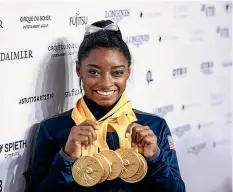  ?? GETTY IMAGES ?? Simone Biles has won a record 25 medals at the gymnastic world championsh­ips, and next year aims to be become the first woman to repeat as Olympic champion in more than half a century.