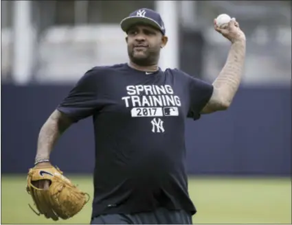  ?? MATT ROURKE — THE ASSOCIATED PRESS ?? New York Yankees pitcher CC Sabathia works out Tuesday in Tampa, Fla.