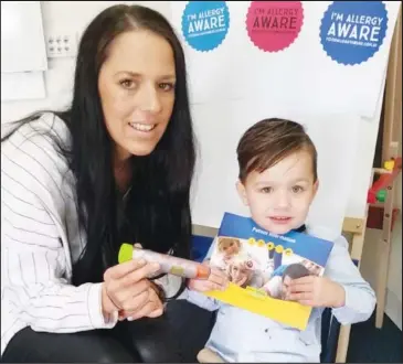  ??  ?? Lett Nagle, pictured here with her son Sonny, hopes to raise awareness of serious food allergies.