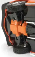  ??  ?? This is an odd feature. The K-member and bottom half of the engine are molded as a single piece and painted orange.