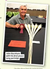  ??  ?? John Barnham with his first place long parsnips