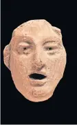  ?? ?? Terracotta acting mask.