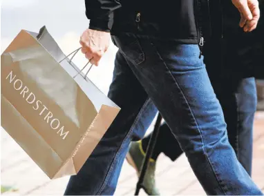  ?? RICK BOWMER/ASSOCIATED PRESS ARCHIVES ?? Seattle-based Nordstrom is wrestling with many of same changes that other major apparel-heavy department stores are facing: a decline in mall traffic, lower consumer spending on apparel and online shopping.