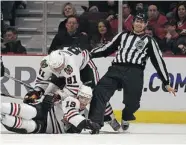  ?? GETTY IMAGES ?? Mark Wheler, an NHL official since 1995 is one of six NHL
linesmen working games in Sochi.