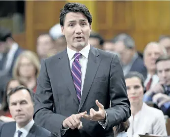  ?? ADRIAN WYLD/THE CANADIAN PRESS ?? Prime Minister Justin Trudeau is abandoning his promise to change the way Canadians vote in federal elections.