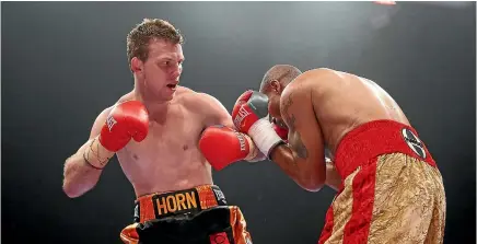  ?? GETTY IMAGES ?? Former school teacher Jeff Horn, left, has won 16 of his 17 profession­al fights and drew the other.