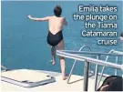  ??  ?? Emilia takes the plunge on the Tiama Catamaran cruise