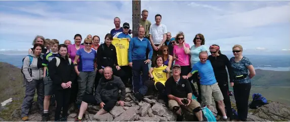  ??  ?? The boots were made for walking - Kanturk hillwallke­rs took on Carrauntoo­hill on Sunday, May 28. On the day, 39 took part in glorious weather conditions which was all in aid of Kanturk Community Hospital and the Irish Cancer Society.