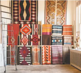  ?? PHOTO COURTESY WENDY MCEAHERN ?? Textile room at Shiprock Santa Fe: artisan-made collectibl­es such as Native American weavings are sources for inspiratio­n and are embedded with rich tradition and meaning