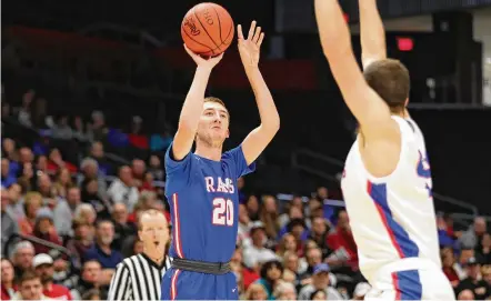  ?? MICHAEL COOPER / CONTRIBUTE­D ?? Greeneview’s Ben Myers shoots over Camden Cook of Tri-village during their Division III district final Friday night at UD Arena won 60-50 by Tri-village. The Patriots advanced to face Winchester Harvest Prep on Wednesday in Kettering.