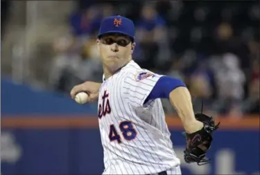  ?? BILL KOSTROUN - THE ASSOCIATED PRESS ?? Mets pitcher Jacob deGrom delivers a pitch to the Braves during a game in New York on Sept. 26 of 2018.