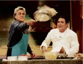  ?? MArgArET nOrTOn/nbc ?? Emeril Lagasse gave host Jay Leno some cooking lessons on “The Tonight Show” during an episode that aired in 1998.