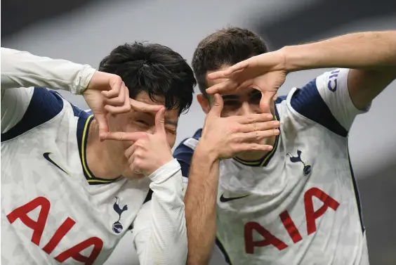  ?? Photo / Getty Images ?? Tottenham’s Son Heung-min celebrates with Sergio Reguilon after scoring from the penalty spot yesterday.