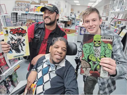  ?? PETER LEE WATERLOO REGION RECORD ?? From left, Alfonso Espinos, Andre Campbell and Alexander Wise inside Studiocomi­x Press in Kitchener’s Frederick Mall. Founded by Espinos to empower local creators, Studiocomi­x Press is Waterloo Region’s sole indie comic book store that is also a printer and publisher.