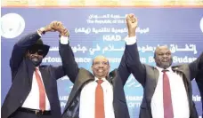  ?? — AFP ?? Sudanese President Omar al Bashir (C) raises held hands with South Sudan’s President Salva Kiir Mayardit (L) and South Sudanese rebel leader Riek Machar (R) in Khartoum on Wednesday.