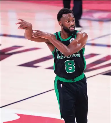  ?? Mark J. Terrill / Associated Press ?? Boston Celtics guard Kemba Walker makes a pass during the Eastern Conference finals on Thursday in Lake Buena Vista, Fla.