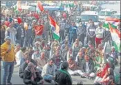  ?? PTI ?? Farmers during a protest on MG Road in Gurugram.