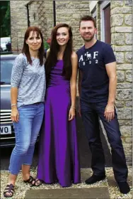  ??  ?? Kirsty today, aged 18, with her parents before her school prom