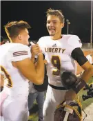  ?? D. Ross Cameron / Special to The Chronicle 2018 ?? Liberty QB Jay Butterfiel­d (right) will enroll at Oregon in January.