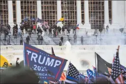  ?? ALEX EDELMAN/AFP VIA GETTY IMAGES ?? Rioters clash with the U.S. Capitol police during an attack at the U.S. Capitol in Washington, D.C. on Jan. 6.